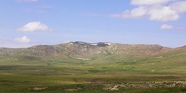 Snow Covered Tops in Deosai Plains